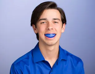 Patient wearing a sports mouthguard